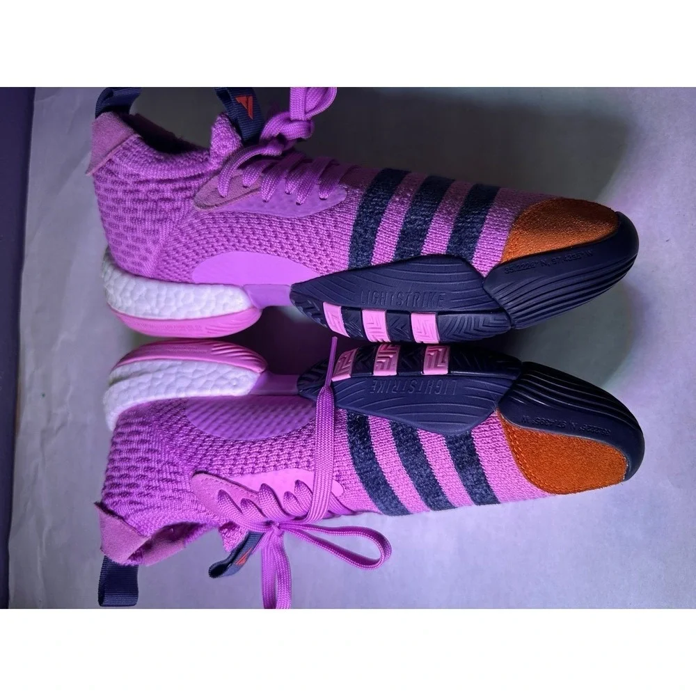 Adidas brand sports sneakers excellent condition purple color with navy blueo